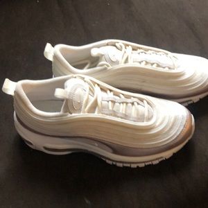 Nike’s white and Rose Gold. Only wore one time